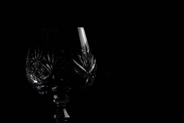 istock Crystal Brandy Glass in the Dark 1293476506