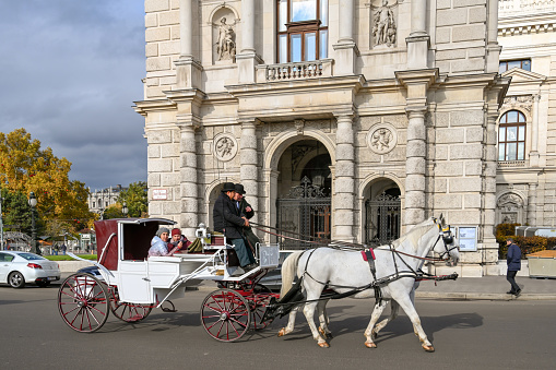 Dresden, Germany - September, 25th - 2023: Horse carriage for tourists on the road.