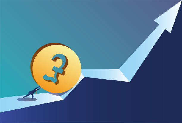 istock Business man works hard to make the pound rise 1293480190