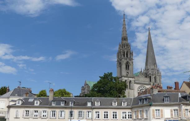 The cathedral in Chartres View of the city of Chartres and its cathedral overlooking the city chartres cathedral stock pictures, royalty-free photos & images