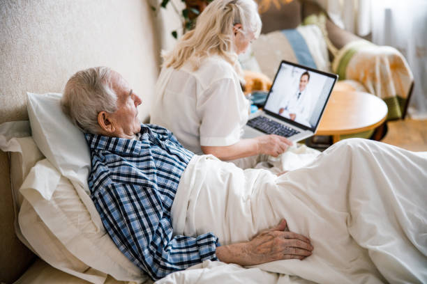istock Wife turning on a medical program 1293481239