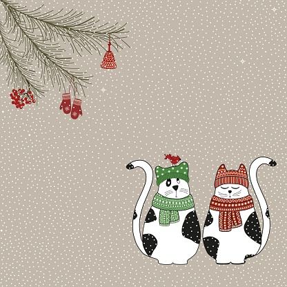 Christmas card with cute cartoon cats on beige background