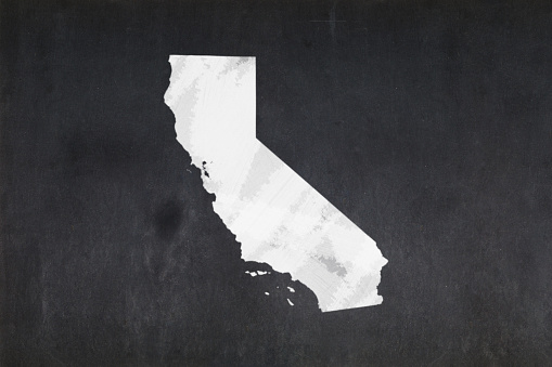 Blackboard with a the map of the State of California (USA) drawn in the middle.