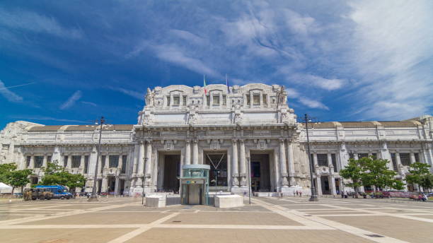 istock Front view of Milan antique central railway station timelapse 1293491624