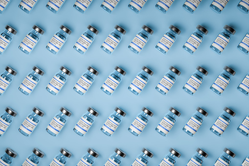 patrón de botellas de vacuna contra covid-19 con líquido de inyección. Ilustración 3D photo
