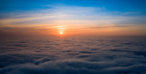 istock Dawn or sunset over the clouds, blue hour, aerial view. 1293494805
