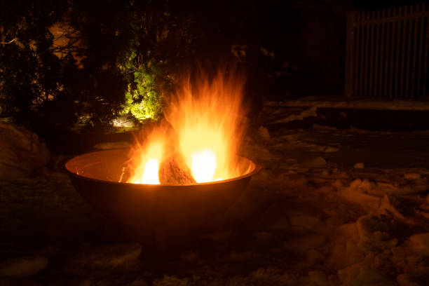 istock Fire in the Fire pit on a snowy winter night 1293501043