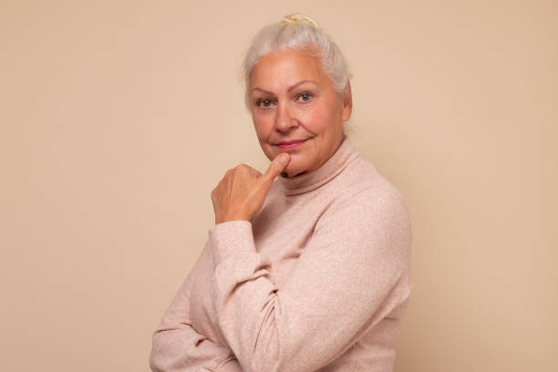 istock Attractive old caucasian woman, pretty smiling face. 1293504022