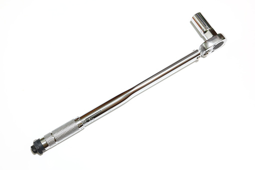Pictured a torque wrench in a white background.
