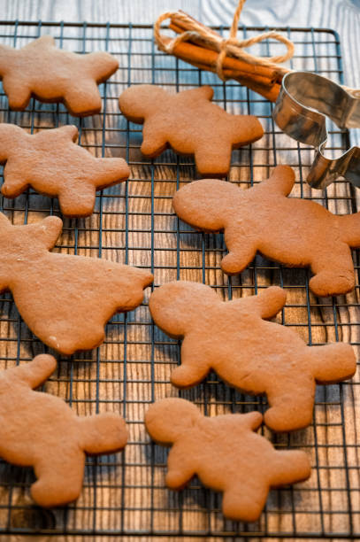 istock Gingerbread Cookies Cooling on a Baking Rack 1293511258