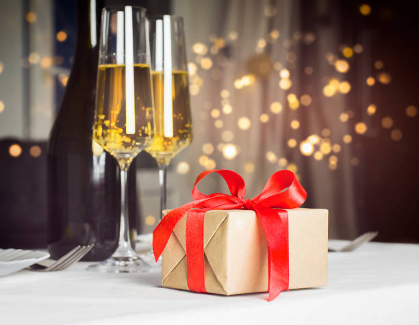 istock gift and glasses of champagne 1293515668