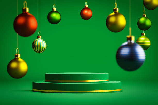 istock Christmas decorations and podium over green 1293516584