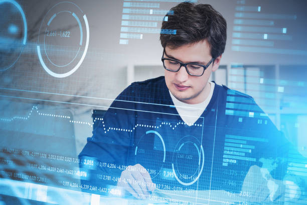 istock Man in glasses in office, business interface 1293517223