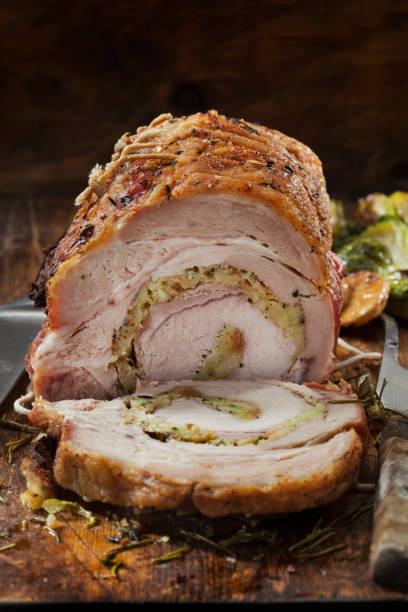 istock Stuffed Pork Roast with Roasted Vegetables 1293519051