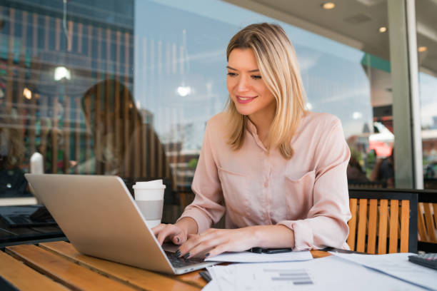 istock Young businesswoman working on her laptop. 1293527132