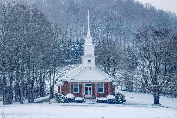 Church on the hill in winter stock photo