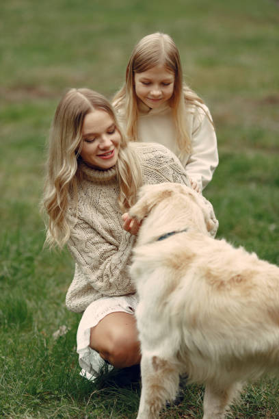 istock Happy family having fun in autumn forest 1293535994