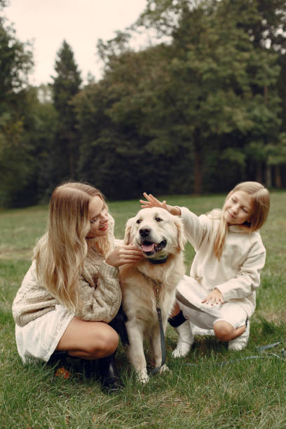 istock Happy family having fun in autumn forest 1293536561