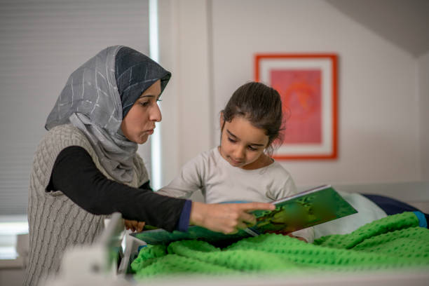 istock Muslim mother and daughter 1293537548