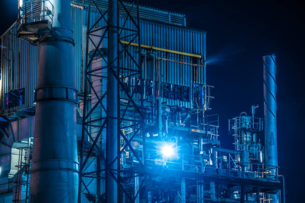 istock Modern manufacturing plant at night 1293548845