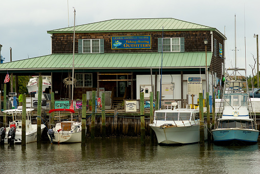 Lewes, Delaware / USA - September 18, 2017: A variety of boats are docked at Lewes Harbour Marina Fishing and Boating Outfitters.