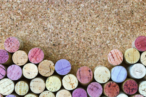 istock Background of colored plugs from wine bottles with space for text. Old wine corks from red and white wine. 1293557382