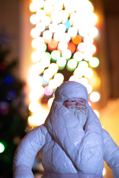 istock Santa Claus with Christmas tree 1293557632