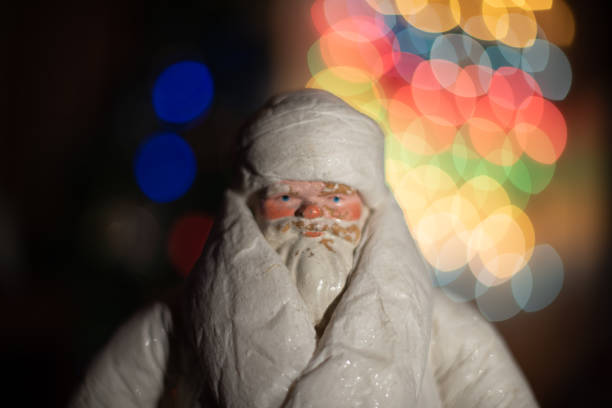 istock Santa Claus with Christmas tree 1293557636