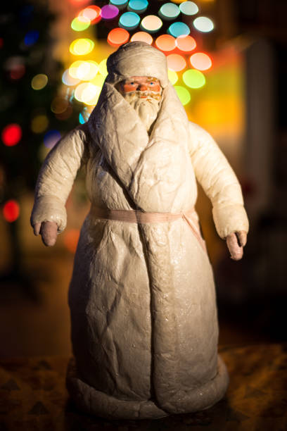istock Santa Claus with Christmas tree 1293558187