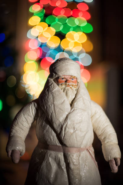 istock Santa Claus with Christmas tree 1293558194