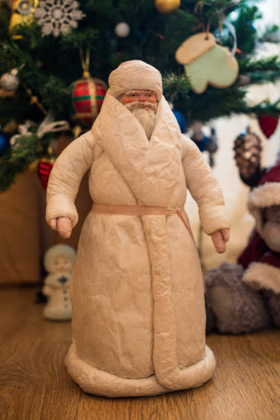 istock Santa Claus with Christmas tree 1293558195