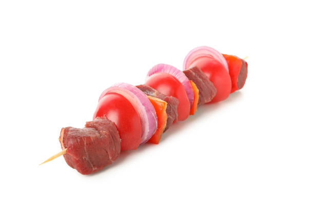 istock Skewer with raw meat and vegetables isolated on white background 1293562661