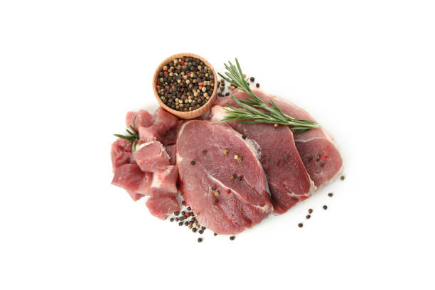 istock Raw steak meat with herbs and spices isolated on white background 1293563647