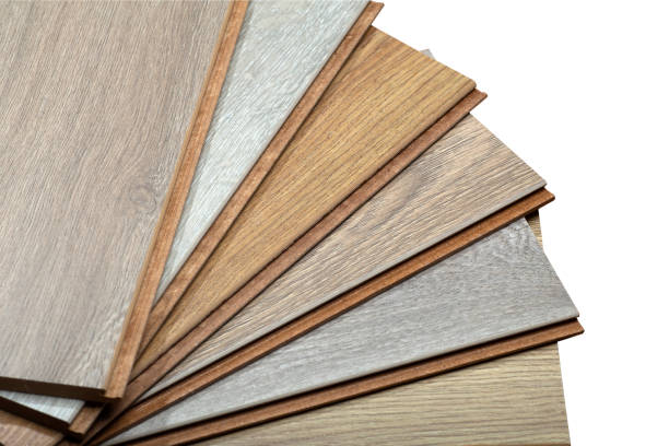 istock Laminate background. Samples of laminate or parquet with a pattern and wood texture for flooring and interior design. Production of wooden floors 1293564699