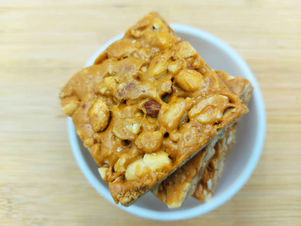 istock heathy indian sweet jaggery peanuts sweet 1293565778