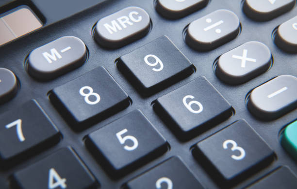 istock Black calculator keyboard. Closeup. Business 1293568958