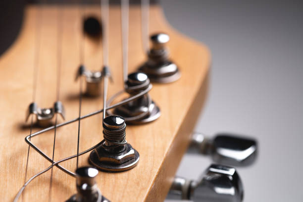 istock Electric guitar strings close-up. Music macro background 1293570972