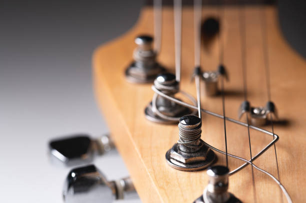 istock Electric guitar strings close-up. Music macro background 1293570978