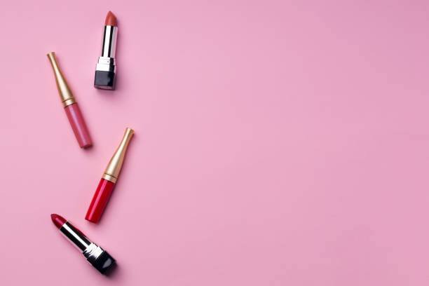 istock Lip make up product on pink background 1293572374