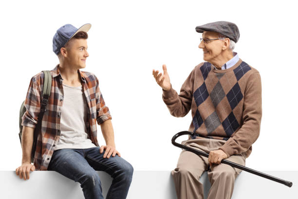 istock Guy sitting on a panel and listening to an elderly man talking 1293573915