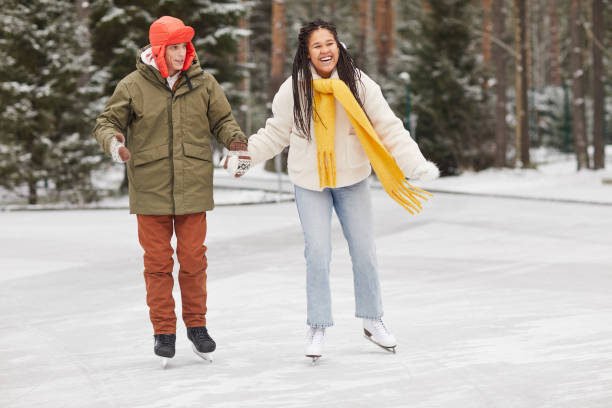 istock Couple on skating rink 1293575355
