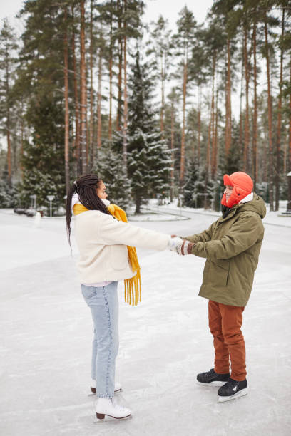 istock Couple on outdoor skating rink 1293575954