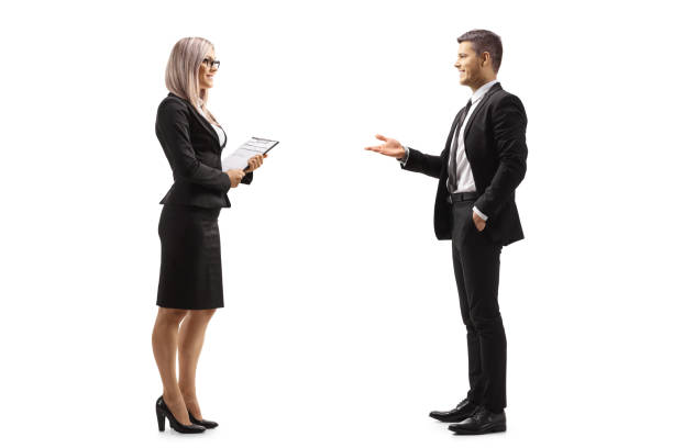 istock Professional man and woman having a conversation 1293576209