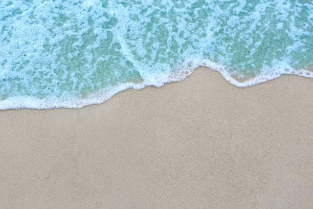 istock Beautiful ocean waves on the sandy beach 1293576238