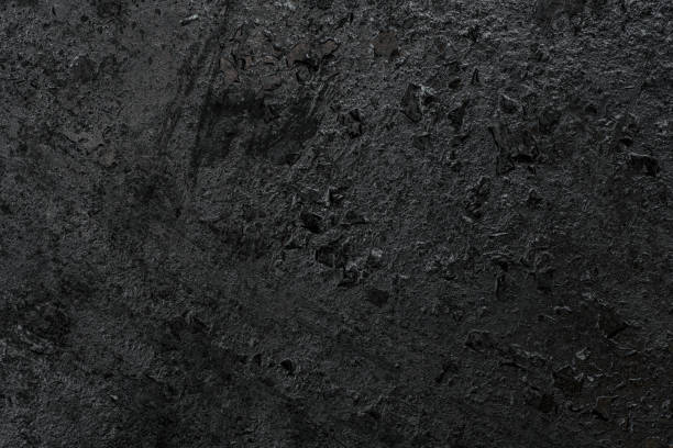 istock old dark and dirty stone graphite plate background. 1293578278