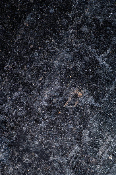istock old dark and dirty stone graphite plate background. 1293578322