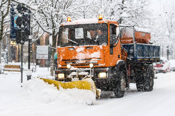 istock A snow plow at work during snowfall on whitewashed streets in the city 1293580787