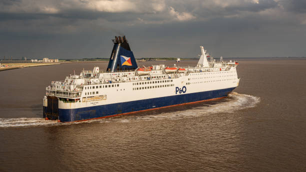 Kingston upon Hull, England Kingston upon Hull, England, UK - May 22, 2019: A P&O ferry leaving the harbour and navigating on the River Humber kingston harbour stock pictures, royalty-free photos & images