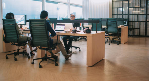 istock asian chinese white collar worker working and communicate in their office workstation 1293582964