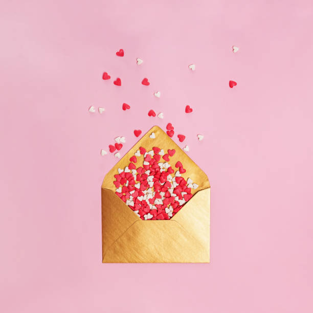 istock Sugar heat shaped sprinkles fly out of golden envelope 1293585992